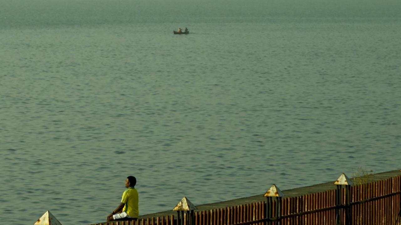 For the past couple of days, Mumbai city has been registering the highest temperatures in the city. Meteorologists alert that warmer days are expected in the days to come. In pic: A man sits near the seafront on a hazy morning in Mumbai/Photo courtesy: AFP
Read more here